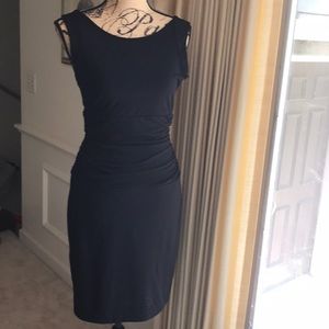 Like new black dress great for work or fun! Extremely flattering in the tummy